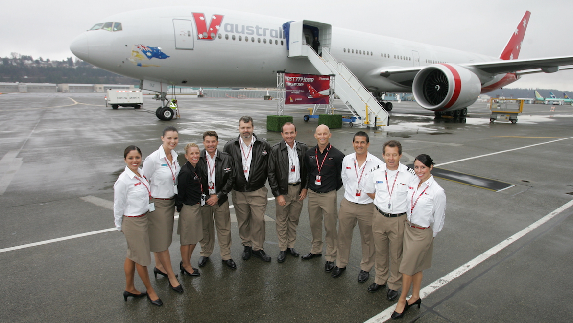 Most of VAU9090’s crew pose with VH-VOZ at Boeing Field, Seattle, two days before the delivery flight back to Australia. (Paul Sadler)