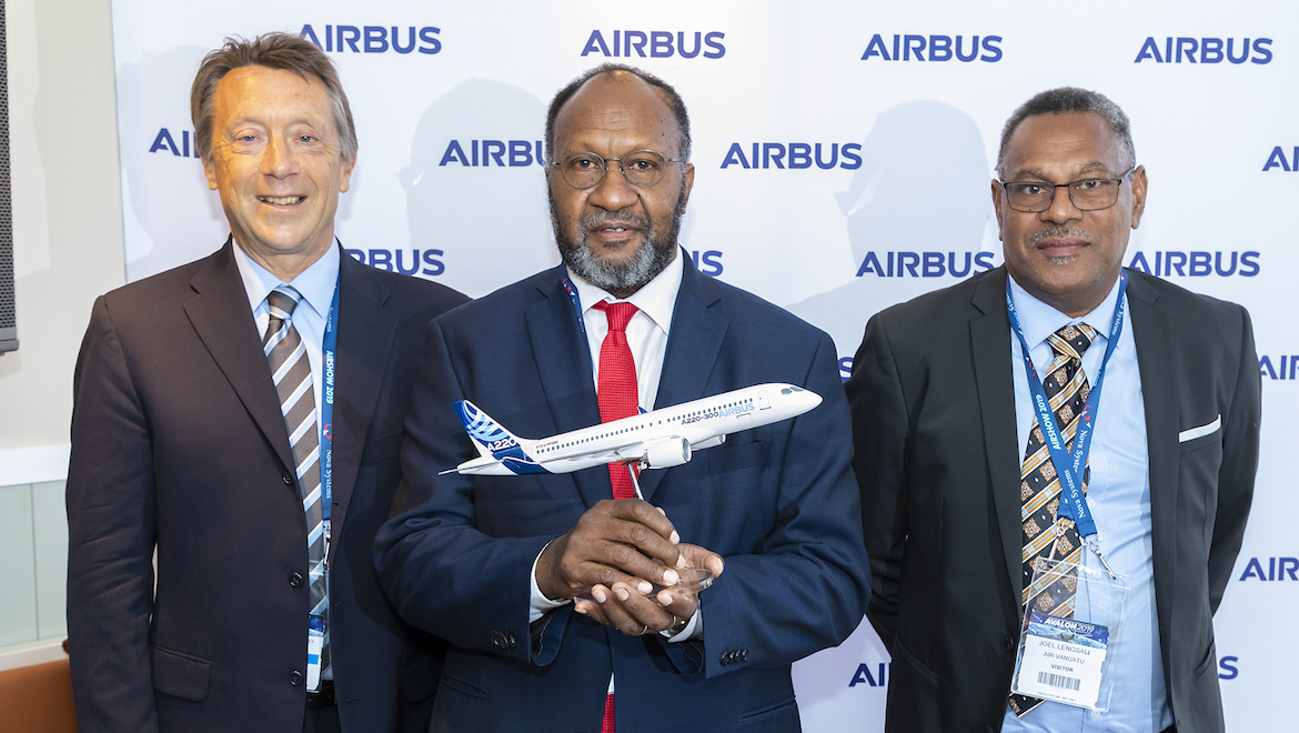 From left Airbus executive vice president for Europe, Africa and the Pacific Christopher Buckley, Vanuatu Prime Minister Charlot Salwai Tabimasmas and Air Vanuatu chairman Joel Lengsau. (Airbus/Seth Jaworski)