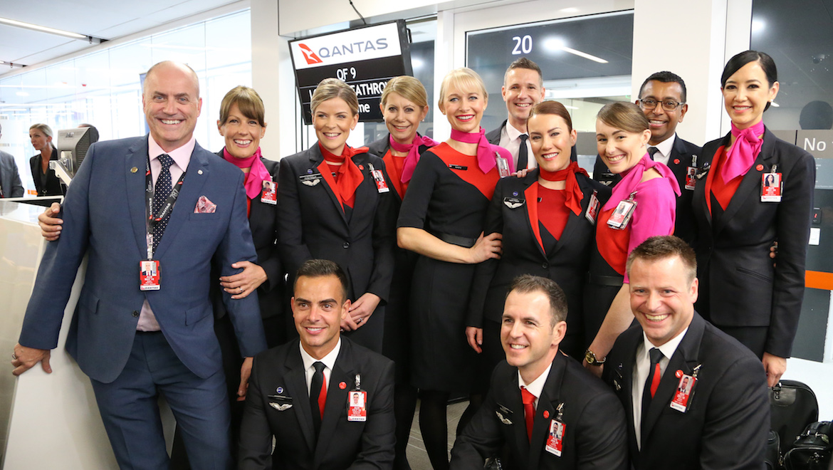 The QF9 cabin crew poses for photos prior to departure. (Victor Pody)