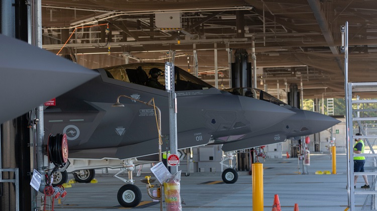 The latest F-35A Joint Strike Fighter aircraft to arrive in Australia are marshalled into the hangars at RAAF Base Williamtown. (Defence)