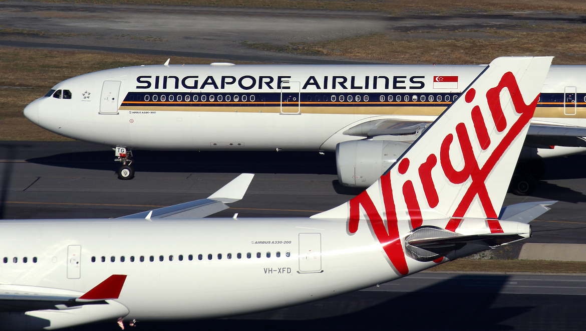 Singapore Airlines and Virgin Australia aircraft side by side at Perth Airport. (Rob Finlayson)