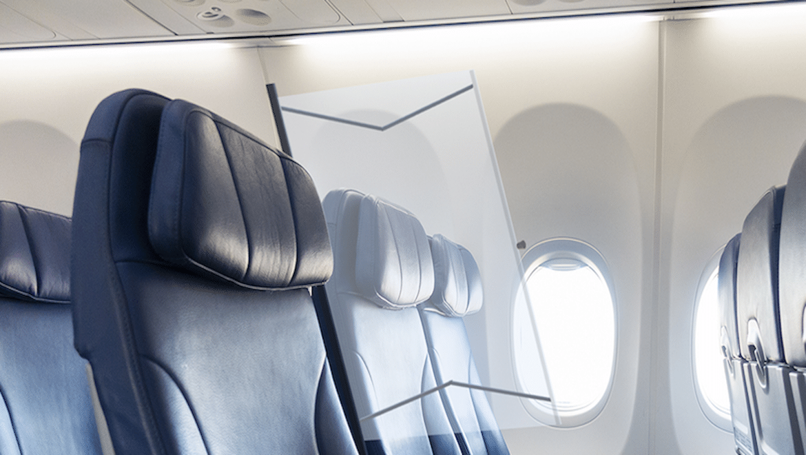 Travel-wary passengers opt for plastic shields between cabin seats